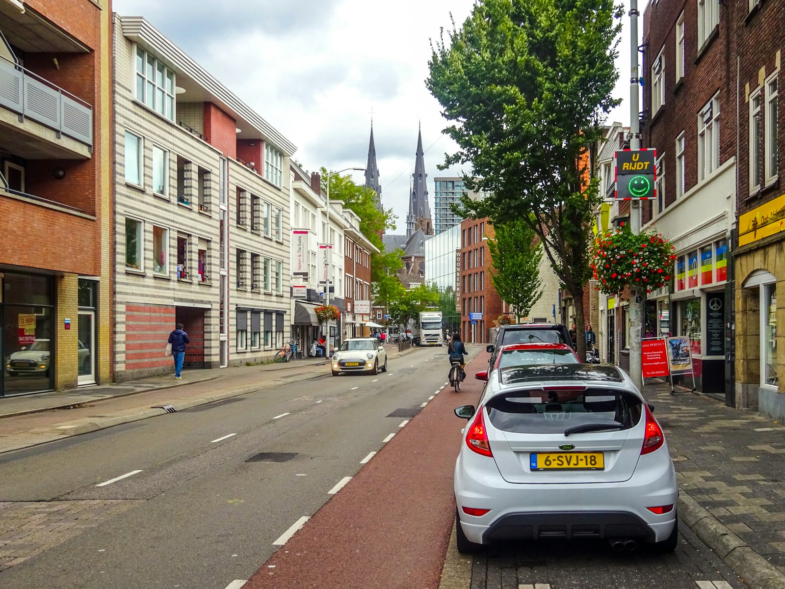 Street view with cars and buildings in a city